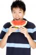 Man Eating Melon