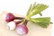 red onions on cutting board
