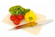 vegetables and knife on cutting board