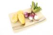 potatoes and onions on white