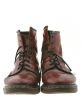 worn boots on white