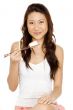 Asian Girl Eating Sushi