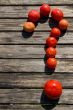 Red tomatoes on table