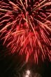 Night celebration fireworks upon dark sky