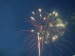 Night celebration fireworks upon dark sky