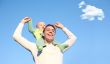 Father with son on shoulders