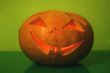 halloween pumpkin on green background