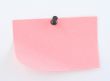 pink paper sheet  pinned