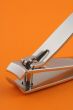 nail clippers on orange
