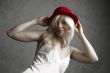 standing woman with hat