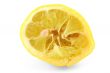 squeezed out lemon on white background