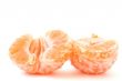peeled tangerines on white