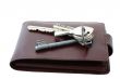 brown leather wallet on white
