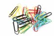 colorful paper clips on white