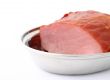 juicy loin inside a metal platter