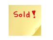 post-it note with handwritten SOLD sign