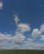 Blue cloudy sky wide angle view