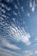 Panorama of blue white cloudy sky wide angle view