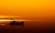 small boat late at night