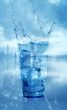 glass with splashing water