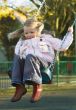 cute girl on  swing