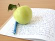 apple with notebook