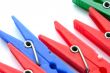 Clothes pegs on white