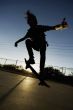 Teenage Skateboarder at Sunset