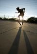 Teenage Skateboarder Doing Trick