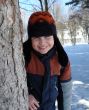 boy near a tree.