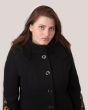 woman in a black coat