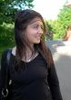 young woman in city street.