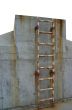 rusty ladder leading to a winner`s place