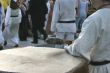 man playing a giant drum