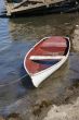 Dinghy on shore in harbor