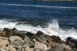 Breaking waves on granite ledges