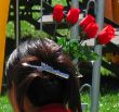 lady with hair clasp and  roses