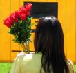 Lady holding roses