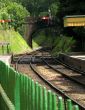 View over fence of rail tunnel