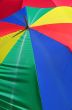coloured umbrella against red umbrella