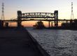 Ship Passes Under Lift Bridge