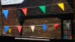 Bunting flags draped across roofspace