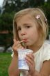 the girl eats ice-cream