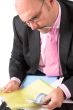 Businessman checking his spreadsheet