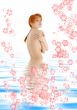 healthy redhead in blue water with flowers #2