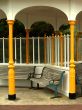 Bench in arched beach shelter