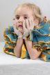 retro thinking toddler girl with gloves