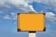 rusty sign post against the sky