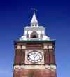 clock tower against blue sky