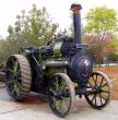 green and black traction engine